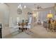 Open-concept dining area with view of living area at 1357 Venezia Ct # 302, Davenport, FL 33896