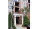 Building exterior showing entry stairs and landscaping at 1357 Venezia Ct # 302, Davenport, FL 33896