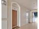 Hallway to unit 303 with neutral colors at 1357 Venezia Ct # 302, Davenport, FL 33896