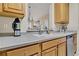 Kitchen featuring stainless steel appliances and a breakfast bar at 1357 Venezia Ct # 302, Davenport, FL 33896