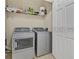 Laundry room with full-size washer and dryer at 1357 Venezia Ct # 302, Davenport, FL 33896