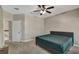 Bedroom featuring a queen-sized bed and neutral decor with a ceiling fan at 1607 Wilson Ave, Orlando, FL 32804