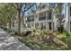Charming townhome featuring a white bridge walkway and a balcony at 1607 Wilson Ave, Orlando, FL 32804