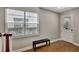 Entryway with a bench and natural light from the large window at 1607 Wilson Ave, Orlando, FL 32804