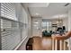 Bright foyer with hardwood floors and a view into the living area at 1607 Wilson Ave, Orlando, FL 32804