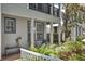 Inviting front porch with seating area, perfect for relaxing outdoors at 1607 Wilson Ave, Orlando, FL 32804