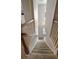 View of carpeted staircase with white railings in a well-lit home at 1607 Wilson Ave, Orlando, FL 32804