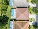 Aerial view of backyard pool and house, showing roof at 195 Hideaway Beach Ln, Kissimmee, FL 34746