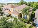 Lovely home with well-manicured lawn and a backdrop of lush trees in a peaceful neighborhood at 195 Hideaway Beach Ln, Kissimmee, FL 34746
