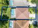 Aerial view of backyard pool and house, showing property lines at 195 Hideaway Beach Ln, Kissimmee, FL 34746