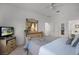 Bedroom showcasing neutral tones, closet, and an ornate dresser with mirror; a calming retreat at 195 Hideaway Beach Ln, Kissimmee, FL 34746