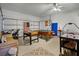 Spacious garage featuring a pool table, foosball table, and air hockey offering entertainment options at 195 Hideaway Beach Ln, Kissimmee, FL 34746