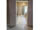 Bathroom showing commode and shower area flanked by dual sink vanities at 204 Canary Island Cir, Davenport, FL 33837