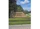 Ridgewood Pointe community sign with stone base, manicured landscaping, and clear signage, conveying a sense of place at 204 Canary Island Cir, Davenport, FL 33837
