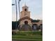 Attractive community water feature with stone accents, lush landscaping, and flowing fountains at 204 Canary Island Cir, Davenport, FL 33837