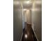 Hallway with wood floors connecting to other areas of the home at 2141 Fawn Meadow Cir, St Cloud, FL 34772