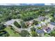 A bird's-eye view of the home in relation to a neighborhood golf course at 2402 Raven Croft Ct, Orlando, FL 32837