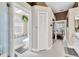 Primary bath hallway showcasing the water closet, linen closet, and bedroom entrance at 2402 Raven Croft Ct, Orlando, FL 32837