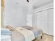 Bedroom with built-in wardrobe cabinets featuring a queen bed and a ceiling fan at 2402 Raven Croft Ct, Orlando, FL 32837