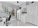 Bright bedroom with a large window, built in wardrobe and closet with light blue walls at 2402 Raven Croft Ct, Orlando, FL 32837