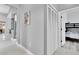 Hallway view showcasing a closet and a glimpse into a bedroom at 2402 Raven Croft Ct, Orlando, FL 32837