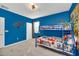 Themed bunk room with comic-book hero bedding and an industrial decor at 2525 Shanti Dr, Kissimmee, FL 34746