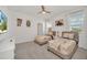 Bright bedroom with two twin beds, Eiffel Tower decor, and neutral accents at 2525 Shanti Dr, Kissimmee, FL 34746