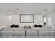 Spacious living room with a large screen, comfortable seating, and ample space at 2525 Shanti Dr, Kissimmee, FL 34746