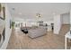 Spacious living area with an open floor plan and seamless flow to the kitchen at 2525 Shanti Dr, Kissimmee, FL 34746