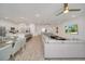 Open-concept living area connecting kitchen, dining and living room in a bright space at 2525 Shanti Dr, Kissimmee, FL 34746