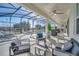 Inviting patio with ceiling fans and a view of the pool and spa at 2525 Shanti Dr, Kissimmee, FL 34746