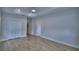 Bedroom boasts wood floors, recessed lights, closet, and easy access to ensuite bathroom at 2673 Calistoga Ave, Kissimmee, FL 34741
