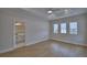 Bedroom featuring wood floors and recessed lighting with an ensuite bath at 2673 Calistoga Ave, Kissimmee, FL 34741