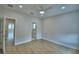 Bright bedroom boasts wood floors, ceiling fan and easy access to the ensuite bath at 2673 Calistoga Ave, Kissimmee, FL 34741