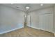 Spacious bedroom with ceiling fan, light wood floors, and double closet at 2673 Calistoga Ave, Kissimmee, FL 34741
