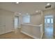 Open second floor hallway with wood flooring and white trim, leading to several rooms at 2673 Calistoga Ave, Kissimmee, FL 34741