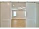 Bright and airy living room with wood-look floors and stylish ceiling light at 2673 Calistoga Ave, Kissimmee, FL 34741