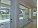 This home boasts an open living area with sliding glass doors leading to a screened outdoor pool area at 2673 Calistoga Ave, Kissimmee, FL 34741