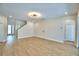 Spacious living room area with recessed lighting and a contemporary light fixture that adds a touch of elegance at 2673 Calistoga Ave, Kissimmee, FL 34741