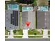 Aerial shot showcasing a home's location among neighboring properties with neat lawns, driveways and close proximity at 2807 Playing Otter Ct, Kissimmee, FL 34747
