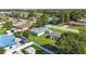 Residential neighborhood featuring a single-story home with a fenced yard and mature trees at 2830 W Oak St, Kissimmee, FL 34741