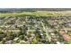 A vibrant neighborhood with manicured lawns and tree-lined streets offers a serene living environment at 2830 W Oak St, Kissimmee, FL 34741