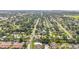 An aerial view showcasing a well-planned residential area with lush greenery and neatly arranged homes at 2830 W Oak St, Kissimmee, FL 34741