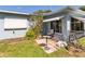 Backyard view of the home and patio area, showcasing the outdoor living space at 2830 W Oak St, Kissimmee, FL 34741