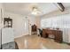 Bright living room with polished floors, stylish decor, and a ceiling fan at 2830 W Oak St, Kissimmee, FL 34741