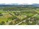 Vast property with scattered homes, mature trees, and plenty of open space for recreational activities at 3181 Canter Ln, Kissimmee, FL 34746