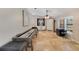 Spacious game room with shuffleboard, bar area, and ample natural light, perfect for entertaining Gathering and friends at 3181 Canter Ln, Kissimmee, FL 34746