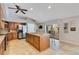 Beautiful kitchen with granite countertops, a center island, stainless steel appliances, and custom cabinetry at 3181 Canter Ln, Kissimmee, FL 34746