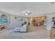 Spacious living room and kitchen combo with modern appliances and tile floors at 3181 Canter Ln, Kissimmee, FL 34746
