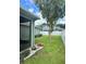 Picture of a well-maintained backyard, with lush green lawn, defined landscaping, and privacy fence at 3339 Primrose Willow Dr, St Cloud, FL 34773